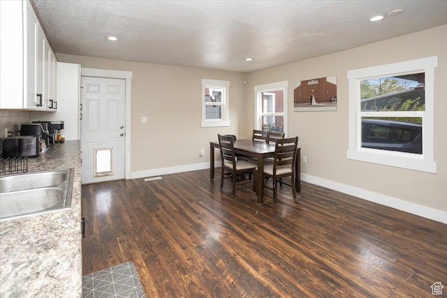 3048 S Harrison Blvd, Ogden, UT 84403 - dining area with recessed lighting, dark wood-style flooring, and baseboards