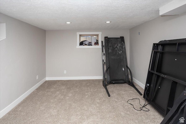 3048 S Harrison Blvd, Ogden, UT 84403 - workout area featuring recessed lighting, a textured ceiling, light colored carpet, and baseboards