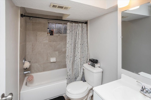 3048 S Harrison Blvd, Ogden, UT 84403 - full bathroom with shower / bath combo, vanity, toilet, visible vents, and a textured ceiling