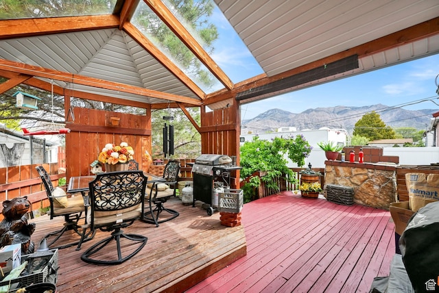 162 Mond St, Ogden, UT 84404 - deck featuring outdoor dining area, a grill, a mountain view, a gazebo, and fence