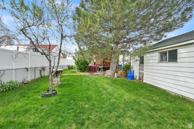 162 Mond St, Ogden, UT 84404 - view of yard featuring fence and a deck