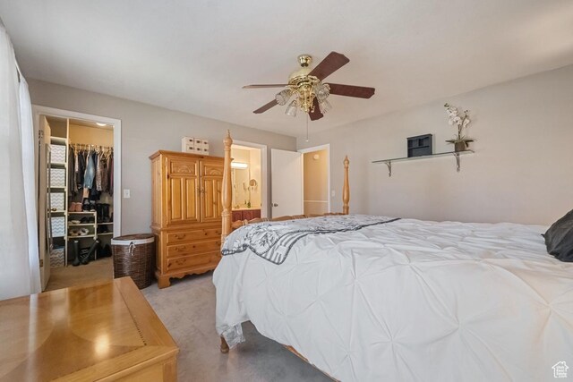 2009 W 7455 S, West Jordan, UT 84084 - bedroom featuring a closet, carpet, a spacious closet, a ceiling fan, and ensuite bath