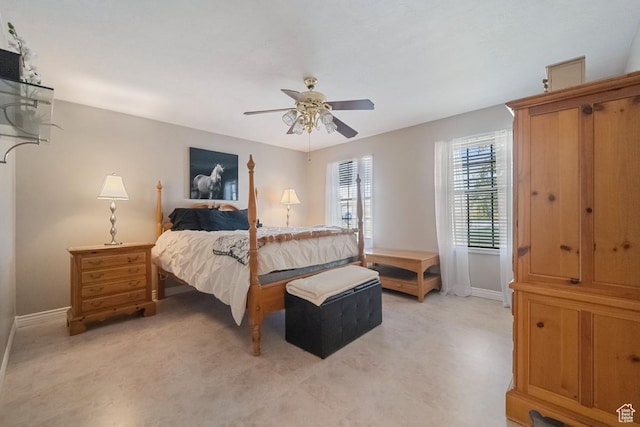 2009 W 7455 S, West Jordan, UT 84084 - bedroom featuring baseboards, ceiling fan, and light colored carpet