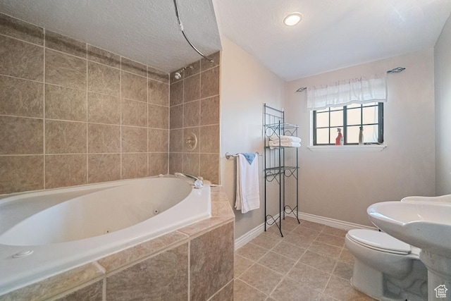 2009 W 7455 S, West Jordan, UT 84084 - full bath featuring a tub with jets, toilet, a shower, and baseboards