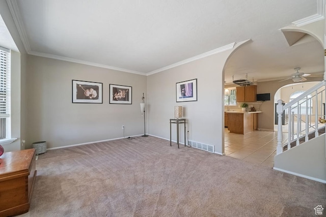 2009 W 7455 S, West Jordan, UT 84084 - spare room featuring visible vents, arched walkways, light carpet, and ornamental molding