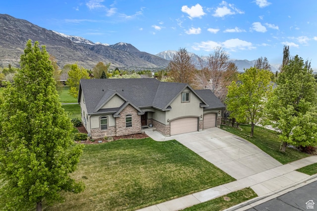 2254 N 1560 W, Pleasant Grove, UT 84062 - view of front of house featuring a front yard, a garage, driveway, stone siding, and stucco siding