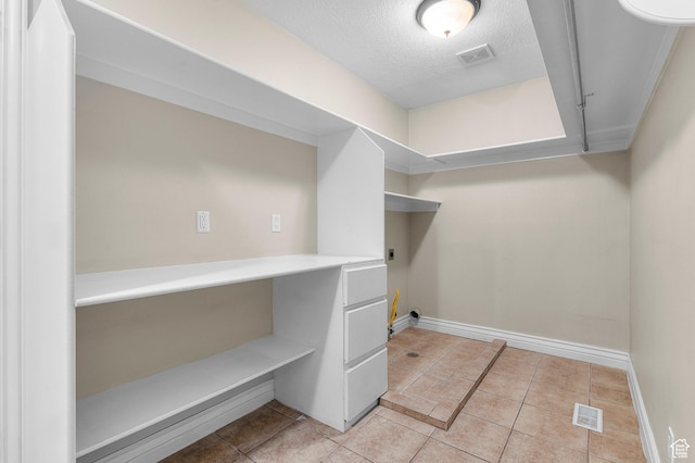2254 N 1560 W, Pleasant Grove, UT 84062 - washroom featuring electric dryer hookup, visible vents, laundry area, and baseboards