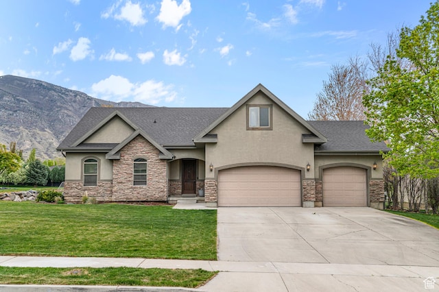 view of front of house featuring stucco siding, a front yard, concrete driveway, and stone siding