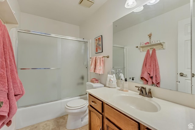 1605 E 6535 S, Murray, UT 84121 - full bathroom featuring vanity, toilet, bath / shower combo with glass door, and tile patterned floors