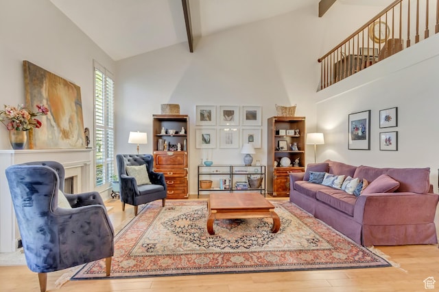 1605 E 6535 S, Murray, UT 84121 - living room with wood finished floors, beam ceiling, and high vaulted ceiling