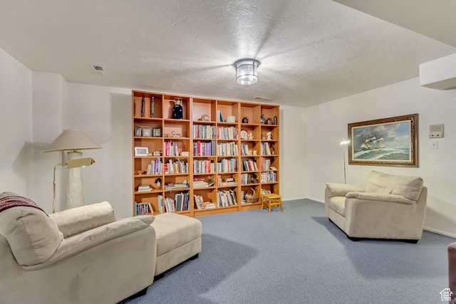 1605 E 6535 S, Murray, UT 84121 - living area with carpet flooring, baseboards, and a textured ceiling