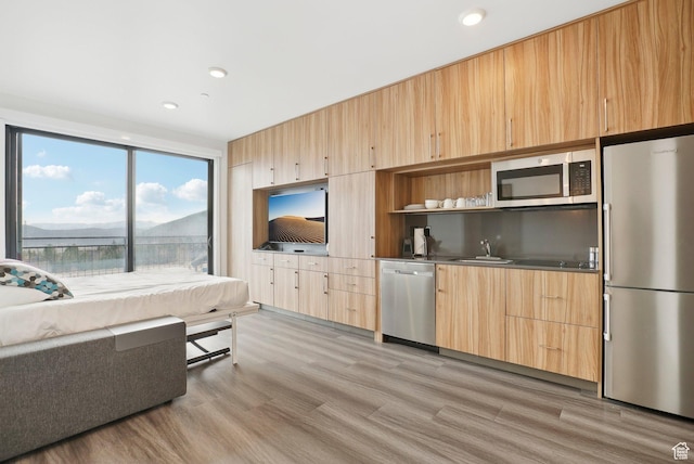 2670 Canyons Resort Dr Unit 127, Park City, UT 84098 - living area featuring expansive windows, recessed lighting, and light wood-style flooring