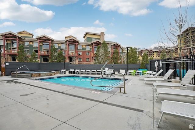 2670 Canyons Resort Dr Unit 127, Park City, UT 84098 - pool with fence, a patio area, a residential view, and a hot tub