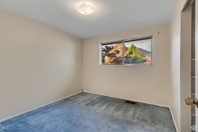 6796 S Nye Dr, Cottonwood Heights, UT 84121 - spare room with visible vents, baseboards, and carpet floors