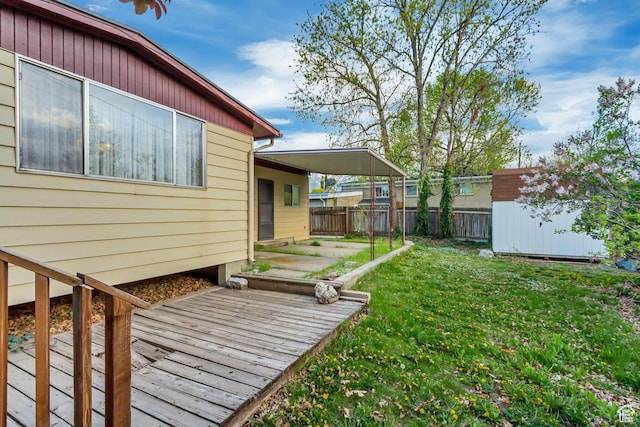 6796 S Nye Dr, Cottonwood Heights, UT 84121 - view of yard with a deck, fence, an outdoor structure, and a storage shed
