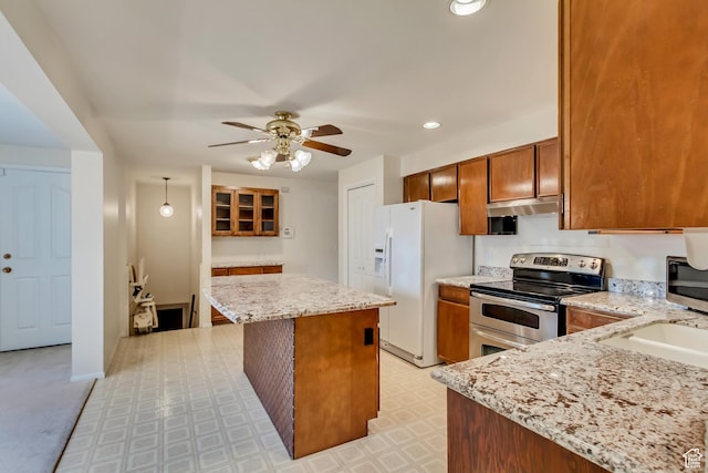 6796 S Nye Dr, Cottonwood Heights, UT 84121 - kitchen featuring under cabinet range hood, stainless steel appliances, ceiling fan, a kitchen island, and light floors