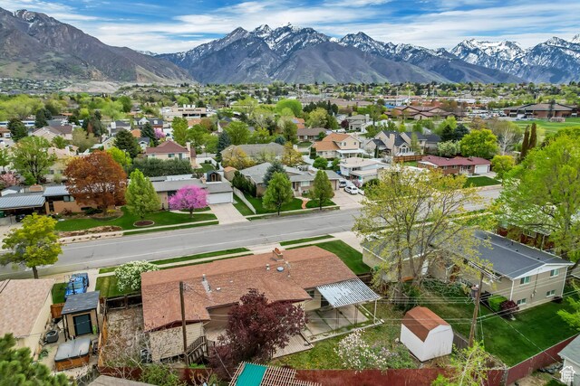 6796 S Nye Dr, Cottonwood Heights, UT 84121 - drone / aerial view with a residential view and a mountain view