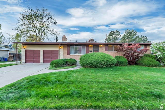 6796 S Nye Dr, Cottonwood Heights, UT 84121 - view of front facade with a front lawn, a chimney, brick siding, concrete driveway, and an attached garage