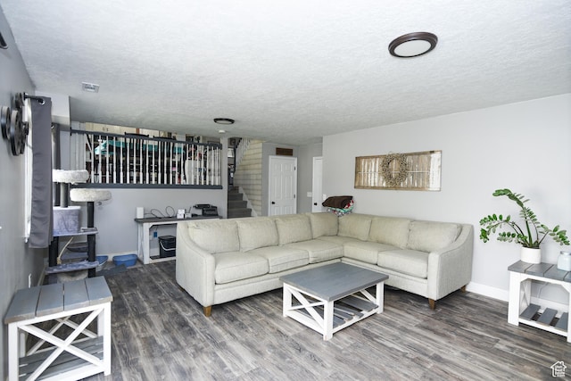 26 Orchard Ln S, Grantsville, UT 84029 - living area with baseboards, stairs, a textured ceiling, and wood finished floors