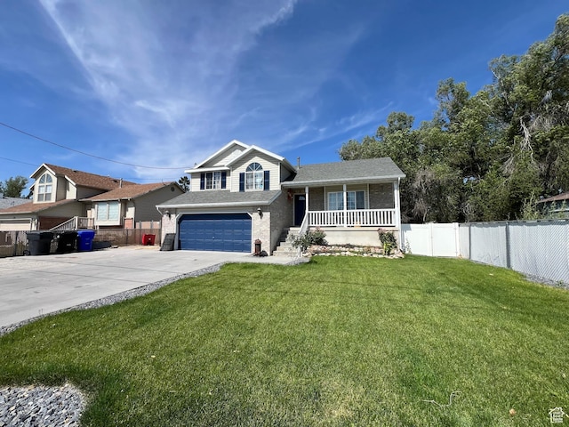 26 Orchard Ln S, Grantsville, UT 84029 - split level home featuring a porch, driveway, an attached garage, brick siding, and roof with shingles