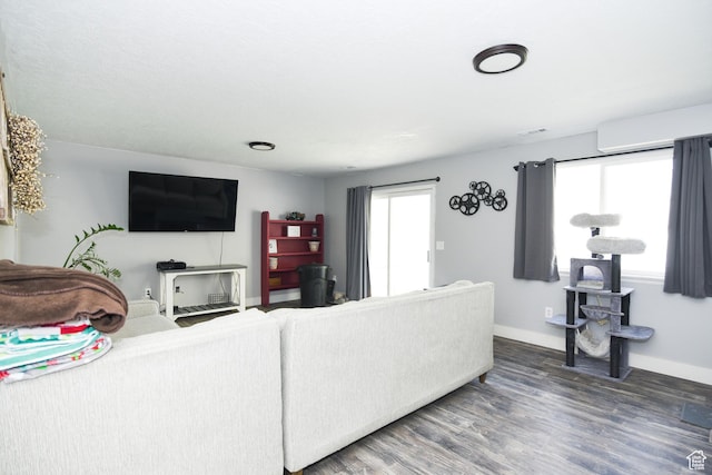 26 Orchard Ln S, Grantsville, UT 84029 - living room with baseboards, visible vents, and wood finished floors