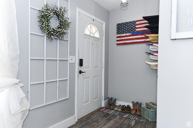26 Orchard Ln S, Grantsville, UT 84029 - entryway with baseboards and wood finished floors