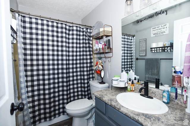 26 Orchard Ln S, Grantsville, UT 84029 - bathroom featuring vanity, a textured ceiling, toilet, and a shower with curtain