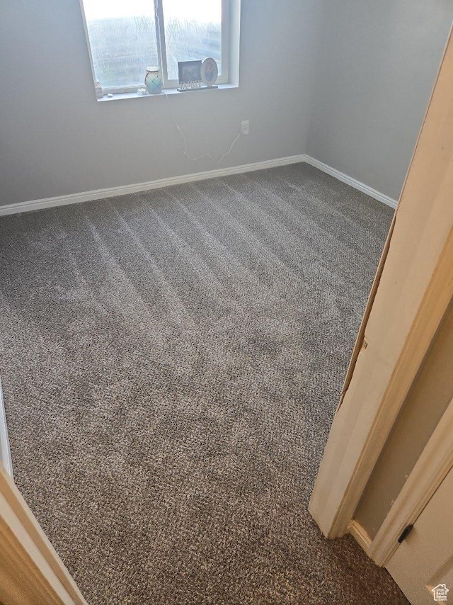 26 Orchard Ln S, Grantsville, UT 84029 - unfurnished room with baseboards and carpet