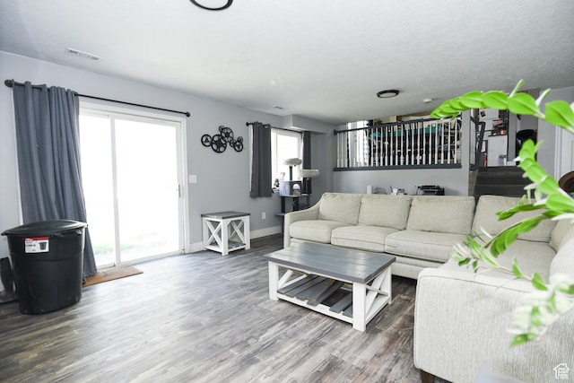 26 Orchard Ln S, Grantsville, UT 84029 - living room featuring baseboards, visible vents, and wood finished floors