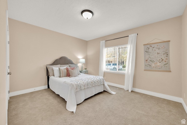 6872 S Triumph Ln, West Jordan, UT 84088 - bedroom with carpet floors and baseboards