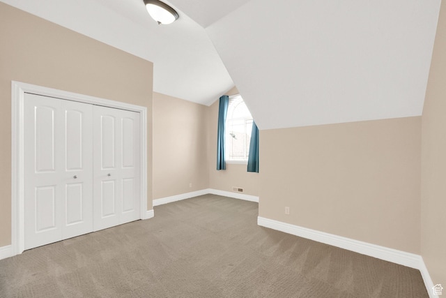 6872 S Triumph Ln, West Jordan, UT 84088 - additional living space with carpet, lofted ceiling, and baseboards