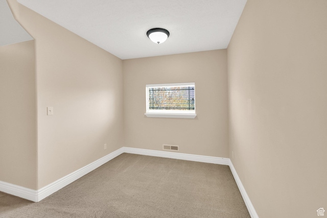 6872 S Triumph Ln, West Jordan, UT 84088 - carpeted spare room featuring baseboards