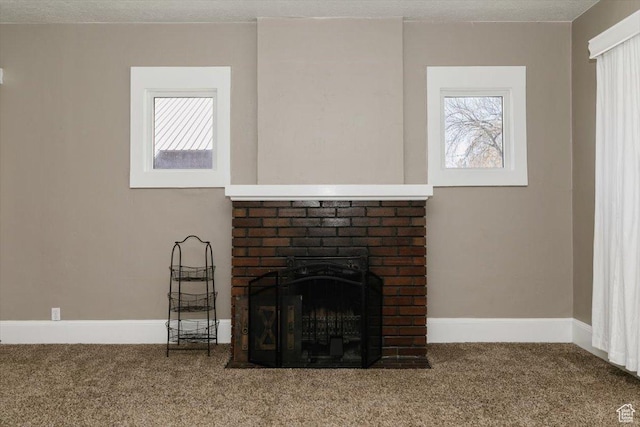 details with carpet floors, baseboards, and a brick fireplace