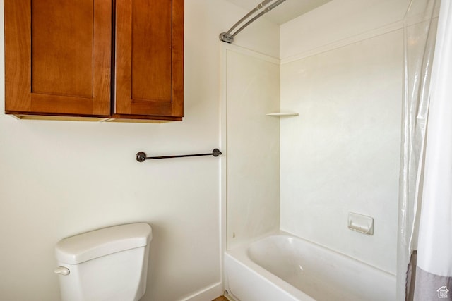 full bath featuring shower / bath combo with shower curtain and toilet