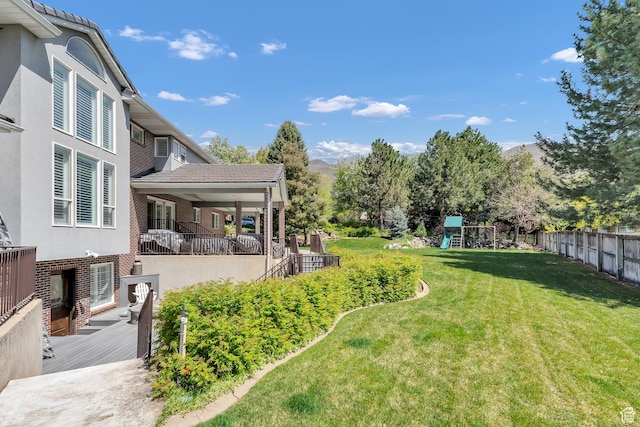 773 Northridge Ct, Farmington, UT 84025 - view of yard with a deck, a playground, and fence