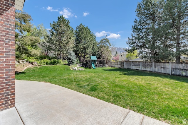 773 Northridge Ct, Farmington, UT 84025 - view of yard with fence, a patio area, and a playground