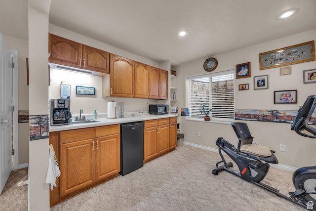 kitchen with light colored carpet, baseboards, recessed lighting, a sink, and light countertops
