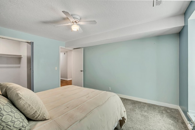 2270 E 4500 S Unit 2A, Holladay, UT 84117 - bedroom with baseboards, a textured ceiling, ceiling fan, and carpet