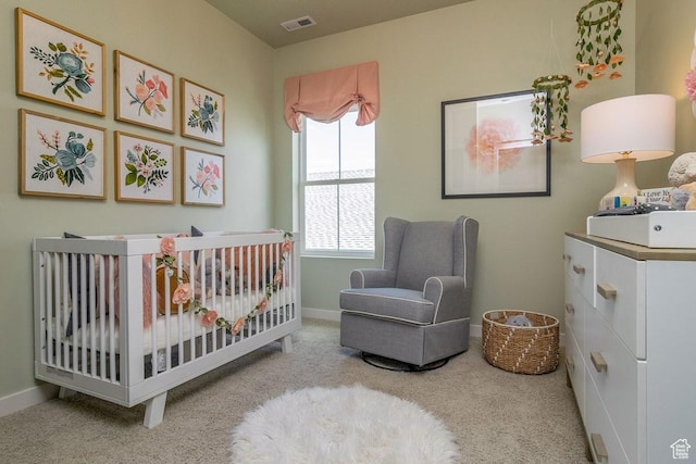 5078 W Rambutan Way S Unit 125, South Jordan, UT 84009 - bedroom with a crib, carpet flooring, and baseboards