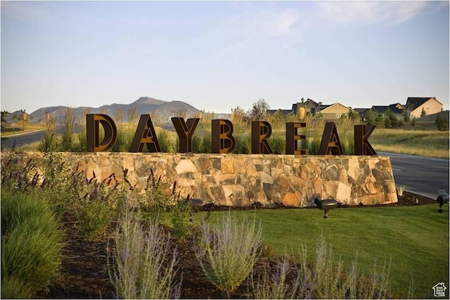 5078 W Rambutan Way S Unit 125, South Jordan, UT 84009 - community / neighborhood sign with a yard and a mountain view