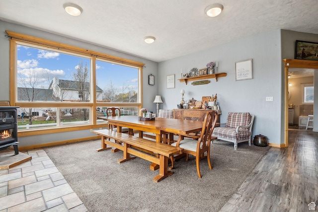 875 W Oak Ln, Francis, UT 84036 - dining area with a wood stove and baseboards