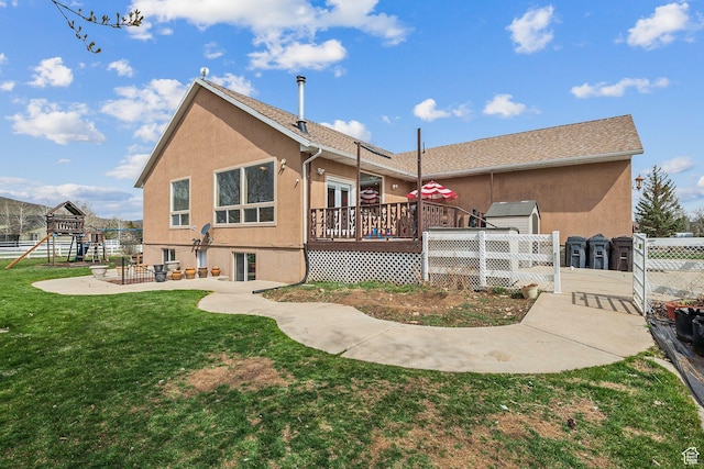875 W Oak Ln, Francis, UT 84036 - back of house featuring a patio, a yard, a deck, stucco siding, and fence