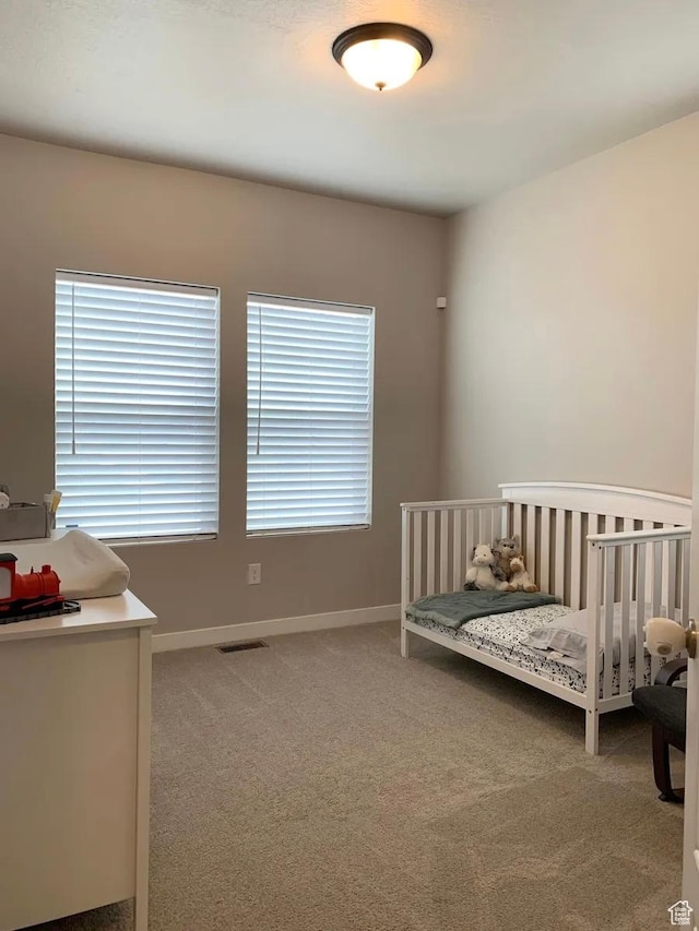 4190 W Penstemon Way, Lehi, UT 84043 - bedroom with visible vents, a nursery area, carpet floors, and baseboards