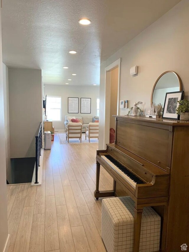 4190 W Penstemon Way, Lehi, UT 84043 - hallway with a textured ceiling, light wood-type flooring, and recessed lighting
