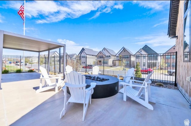 4190 W Penstemon Way, Lehi, UT 84043 - view of patio / terrace featuring a fire pit, fence, and a residential view