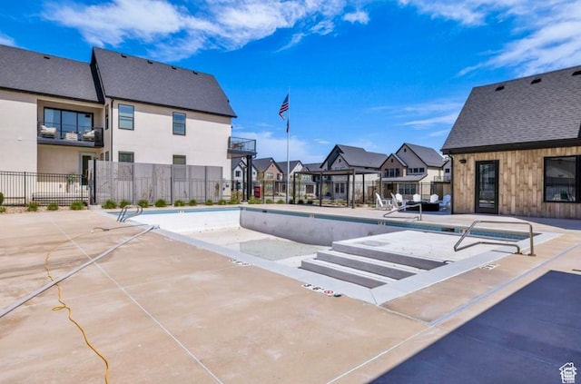 4190 W Penstemon Way, Lehi, UT 84043 - community pool with a patio, fence, and a residential view
