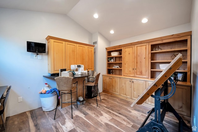 3200 E 3900 S, Salt Lake City, UT 84124 - office area featuring lofted ceiling, built in desk, visible vents, recessed lighting, and wood finished floors