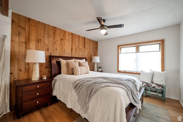 3200 E 3900 S, Salt Lake City, UT 84124 - bedroom featuring wood finished floors, a ceiling fan, and wooden walls