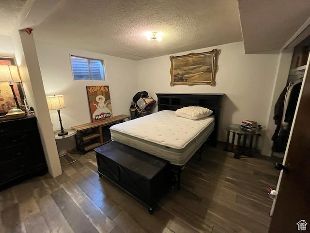 397 W 4125 N, Pleasant View, UT 84414 - bedroom with a textured ceiling and hardwood / wood-style floors