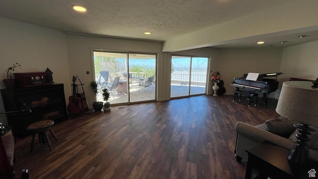 397 W 4125 N, Pleasant View, UT 84414 - living area with recessed lighting, a textured ceiling, and wood finished floors